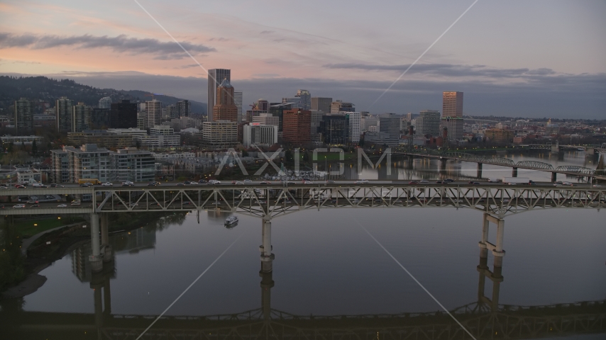 Marquam Bridge, near marina, Hawthorne Bridge, and downtown skyline at sunset, Downtown Portland, Oregon Aerial Stock Photo AX155_201.0000000F | Axiom Images