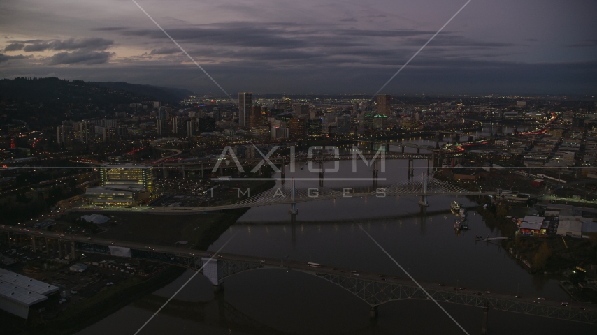 Downtown skyscrapers and bridges over the Willamette River at sunset, Downtown Portland, Oregon Aerial Stock Photo AX155_249.0000000F | Axiom Images