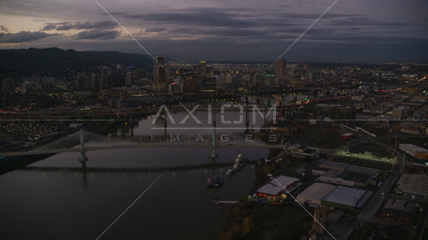 Skyscrapers and bridges over the Willamette River at sunset, Downtown Portland, Oregon Aerial Stock Photo AX155_249.0000272F | Axiom Images