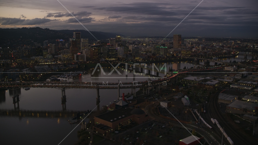 Skyscrapers and bridges over the Willamette River at sunset, Downtown Portland, Oregon Aerial Stock Photo AX155_250.0000324F | Axiom Images