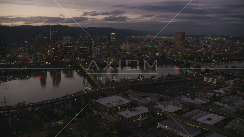 Skyscrapers and bridges over the Willamette River at sunset, Downtown Portland, Oregon Aerial Stock Photo AX155_251.0000324F | Axiom Images