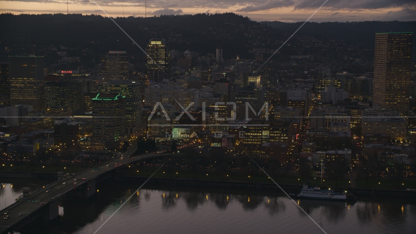 Skyscrapers and the Morrison Bridge over the Willamette River at sunset, Downtown Portland, Oregon Aerial Stock Photo AX155_253.0000309F | Axiom Images