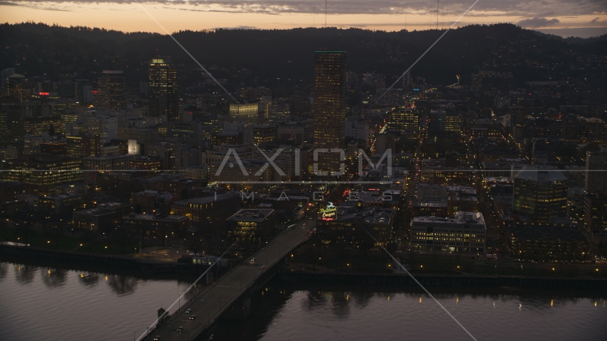 US Bancorp Tower, Burnside Bridge over the Willamette River, and White Stag Sign at sunset, Downtown Portland, Oregon Aerial Stock Photo AX155_254.0000344F | Axiom Images