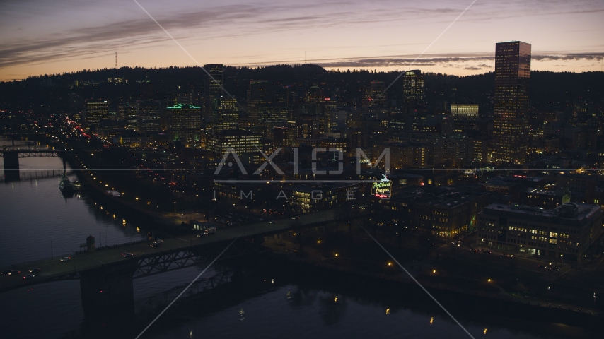 The Willamette River, Burnside Bridge, White Stag sign, and Downtown Portland at sunset, Oregon Aerial Stock Photo AX155_279.0000343F | Axiom Images