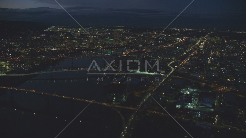 Downtown Portland cityscape, bridges on the Willamette River at night, Oregon Aerial Stock Photo AX155_292.0000000F | Axiom Images