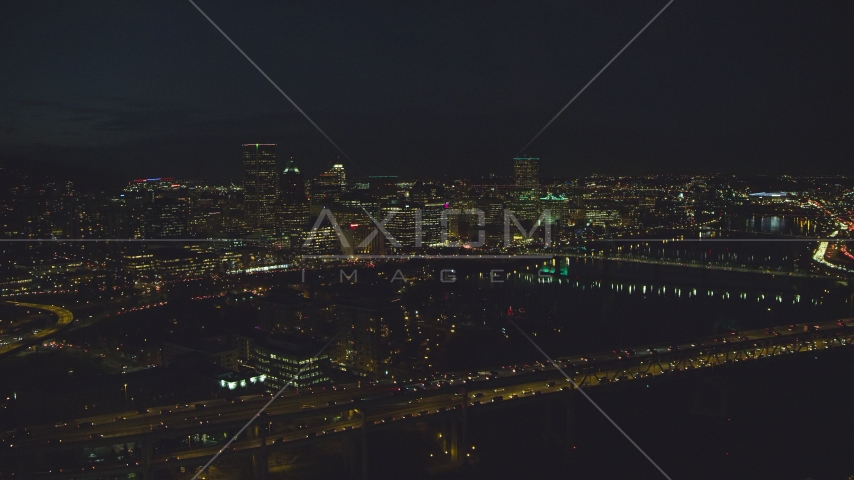 Marquam Bridge and the Downtown Portland city skyline at night, Oregon Aerial Stock Photo AX155_326.0000329F | Axiom Images