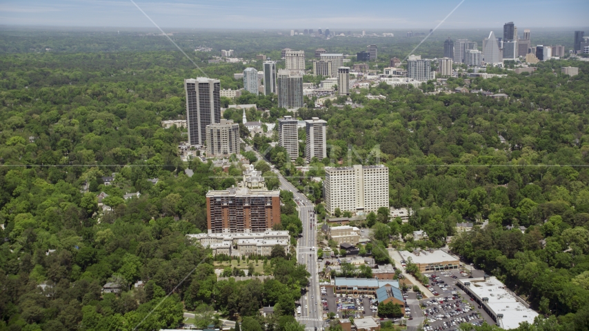 Peachtree Road through office buildings among wooded area, Bulkhead, Georgia Aerial Stock Photo AX36_049.0000120F | Axiom Images
