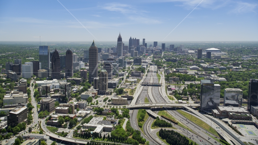 Downtown Connector near Midtown Atlanta skyscrapers, Georgia Aerial Stock Photo AX36_086.0000057F | Axiom Images