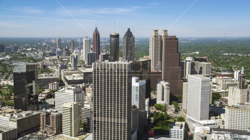 Downtown skyscrapers and office buildings under blue skies, Atlanta, Georgia Aerial Stock Photo AX37_013.0000093F | Axiom Images