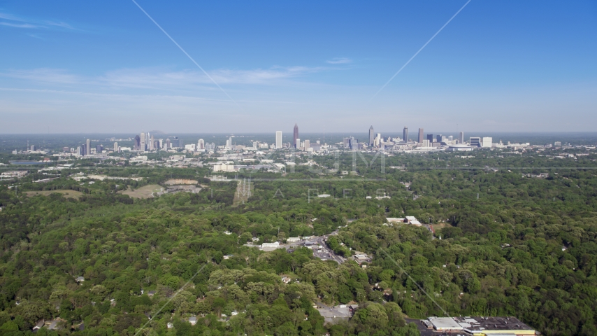 Midtown and Downtown from over forests, Atlanta, Georgia Aerial Stock Photo AX38_003.0000095F | Axiom Images