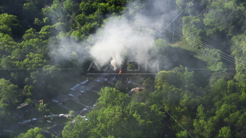 Smoke rising from a burning home, West Atlanta, Georgia Aerial Stock Photo AX38_050.0000229F | Axiom Images