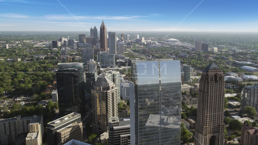 Midtown skyscrapers with more skyscrapers in the distance, Atlanta, Georgia Aerial Stock Photo AX38_067.0000313F | Axiom Images