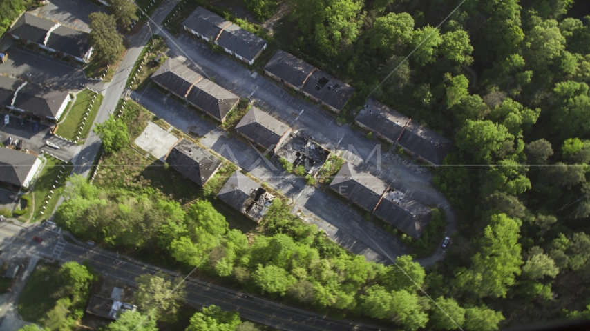 Bird's eye view of abandoned buildings among trees, Atlanta, Georgia Aerial Stock Photo AX38_081.0000041F | Axiom Images