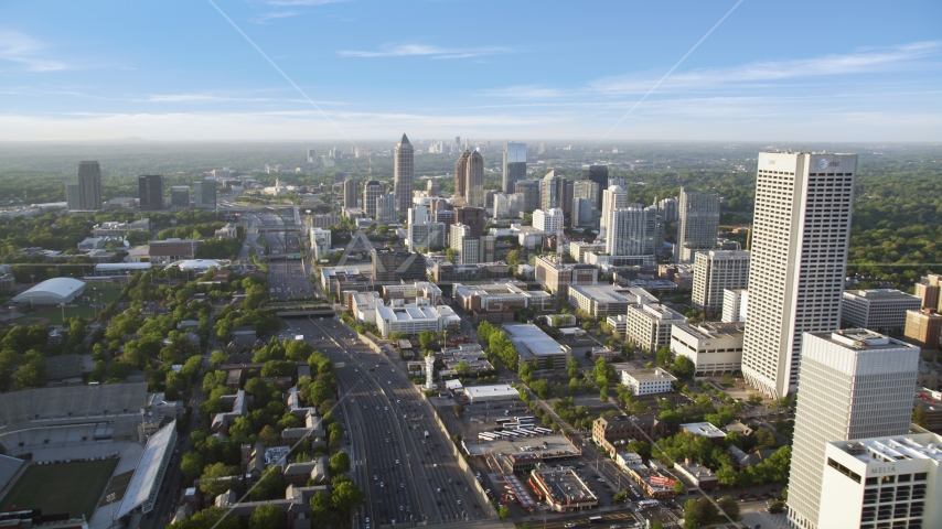 Downtown Connector along city buildings; Midtown Atlanta, Georgia Aerial Stock Photo AX39_049.0000319F | Axiom Images
