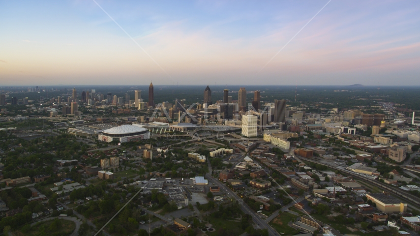 Downtown, Midtown and Georgia Dome in Atlanta at twilight Aerial Stock Photo AX40_001.0000000F | Axiom Images