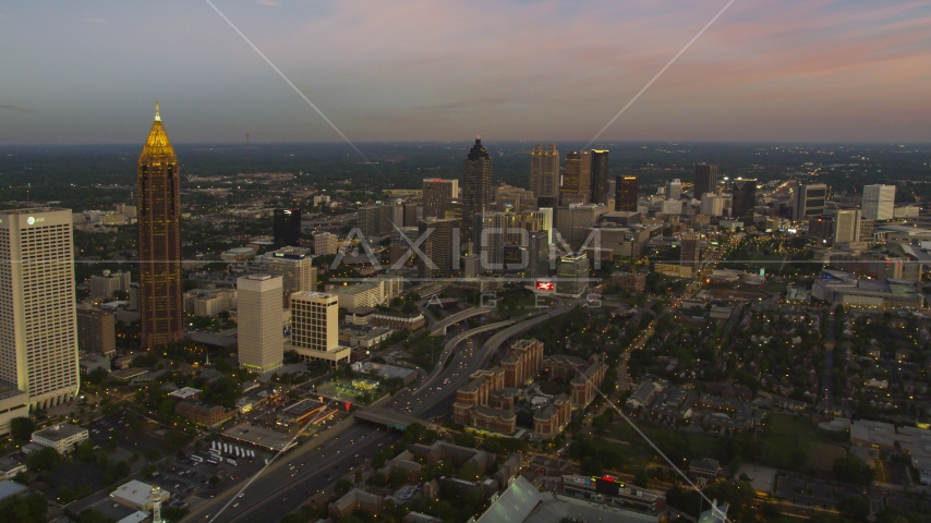 Midtown skyscrapers, Downtown skyscrapers in the background, Atlanta, Georgia, twilight Aerial Stock Photo AX40_012.0000000F | Axiom Images
