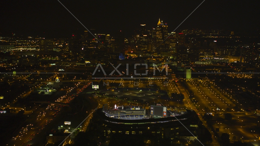 Turner Field with Downtown skyscrapers in the distance, Atlanta, Georgia, night Aerial Stock Photo AX41_005.0000000F | Axiom Images