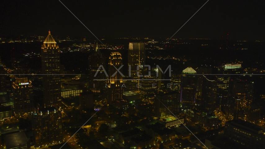 A group of skyscrapers at night in Midtown Atlanta, Georgia Aerial Stock Photo AX41_028.0000078F | Axiom Images