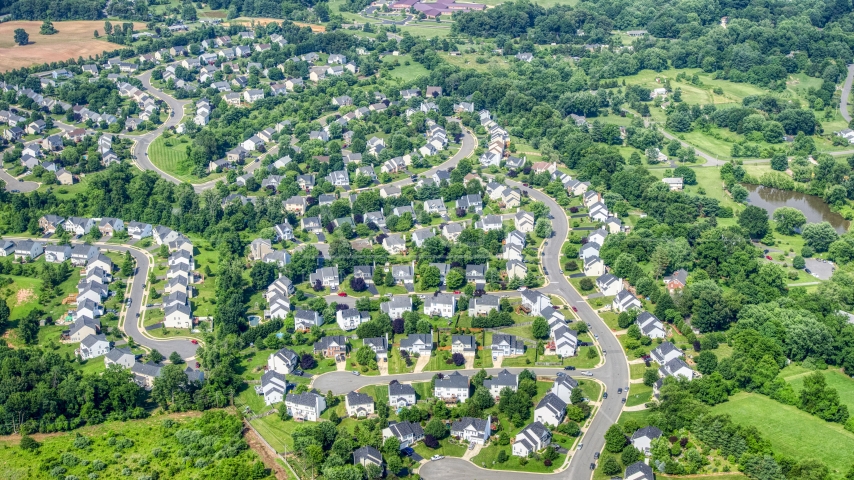 A suburban neighborhood in Burke, Virginia Aerial Stock Photo AXP074_000_0014F | Axiom Images