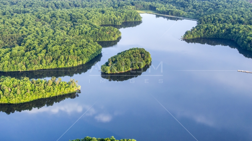 An island in a river surrounded by dense forest near Manassas, Virginia Aerial Stock Photo AXP075_000_0029F | Axiom Images