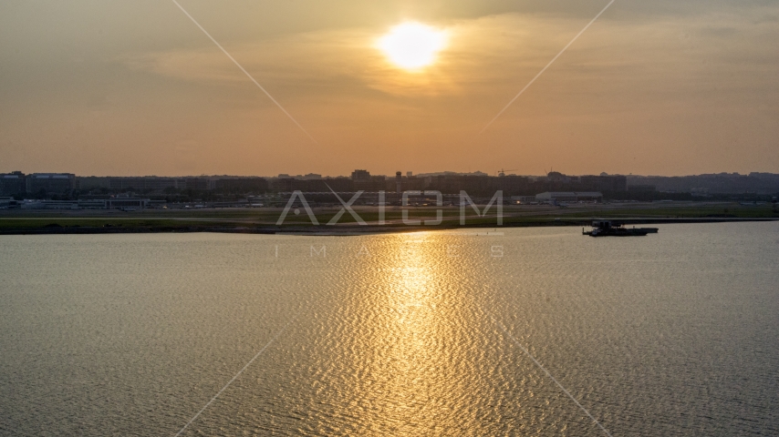 Ronald Reagan Washington National Airport, Arlington, Virginia, sunset Aerial Stock Photo AXP076_000_0005F | Axiom Images