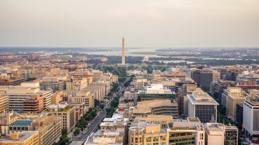 A wide view of the White House, Washington Monument, and Jefferson Memorial, Washington D.C., sunset Aerial Stock Photo AXP076_000_0018F | Axiom Images