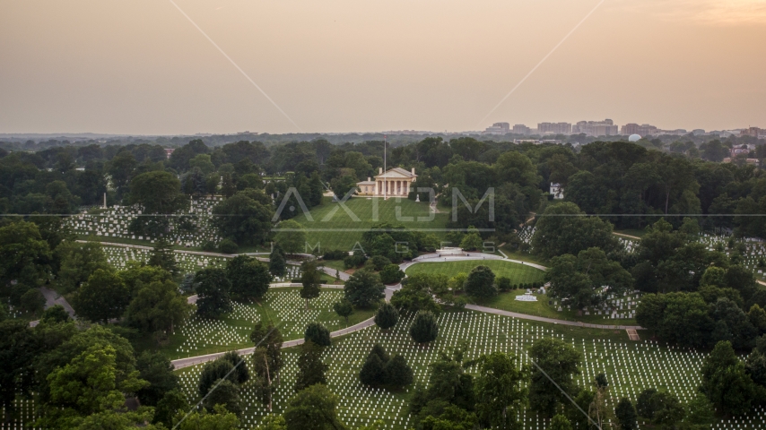 Rows of gravestones near Arlington House at Arlington National Cemetery, Arlington, Virginia, twilight Aerial Stock Photo AXP076_000_0025F | Axiom Images