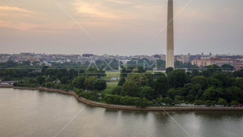 The Washington Monument and White House seen from Tidal Basin, Washington D.C., twilight Aerial Stock Photo AXP076_000_0026F | Axiom Images