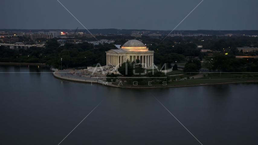 The Jefferson Memorial lit up for evening, Washington, D.C., twilight Aerial Stock Photo AXP076_000_0034F | Axiom Images