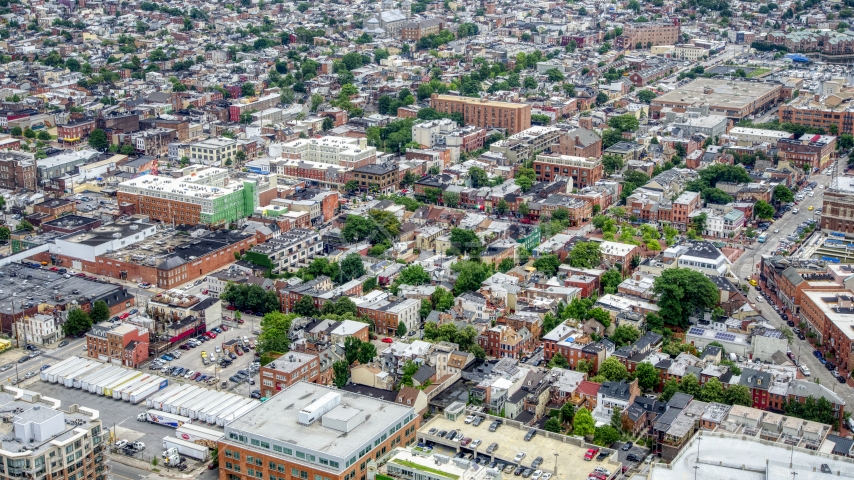Shops and apartment buildings in Baltimore, Maryland Aerial Stock Photo AXP078_000_0008F | Axiom Images