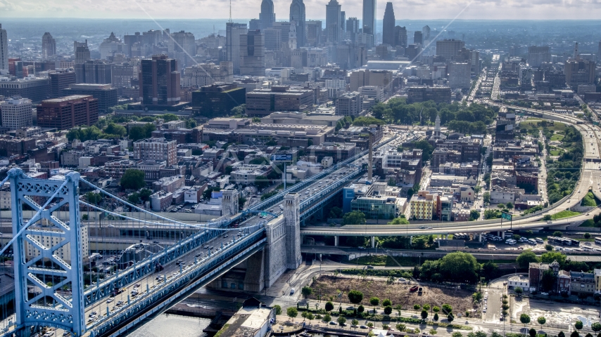 The Benjamin Franklin Bridge with the skyline of Downtown Philadelphia in the background, Pennsylvania Aerial Stock Photo AXP079_000_0002F | Axiom Images