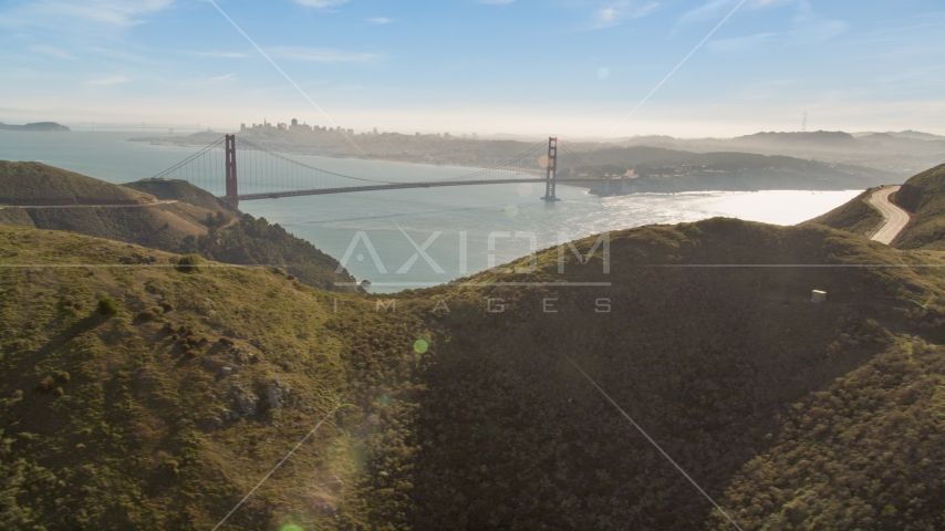Golden Gate Bridge and downtown skyline seen from the Marin Headlands, Marin County, California Aerial Stock Photo DCSF05_044.0000000 | Axiom Images