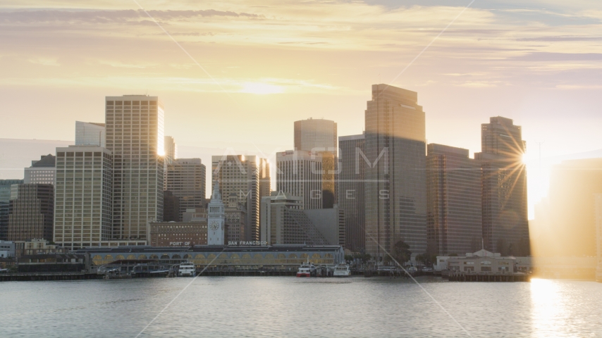 The Ferry Building and skyline of Downtown San Francisco, California, sunset Aerial Stock Photo DCSF07_012.0000045 | Axiom Images