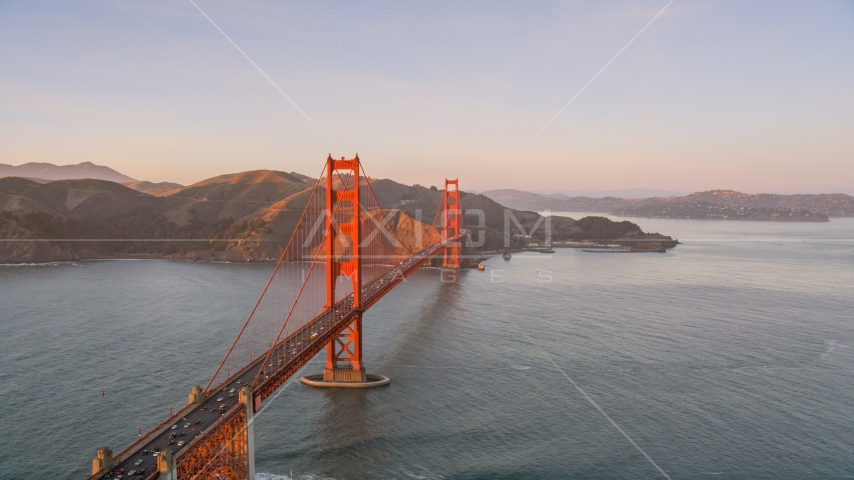 Golden Gate Bridge, Marin Headlands in the background, San Francisco, California, sunset Aerial Stock Photo DCSF07_052.0000301 | Axiom Images