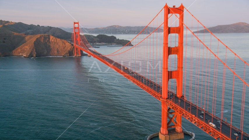 The Golden Gate Bridge, Marin Headlands behind it, San Francisco, California, sunset Aerial Stock Photo DCSF07_053.0000562 | Axiom Images