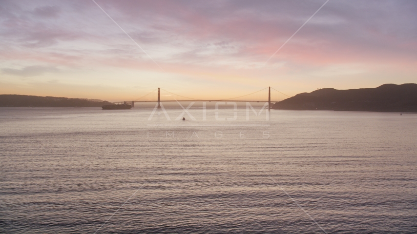 A wide view of the Golden Gate Bridge, San Francisco, California, twilight Aerial Stock Photo DCSF07_082.0000000 | Axiom Images
