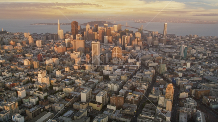 Skyscrapers in Downtown San Francisco, San Francisco Bay in the background, California at sunset Aerial Stock Photo DCSF10_004.0000140 | Axiom Images