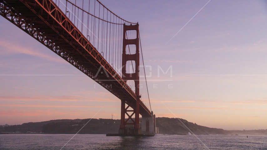 A Golden Gate Bridge tower in San Francisco, California, twilight Aerial Stock Photo DCSF10_035.0000000 | Axiom Images