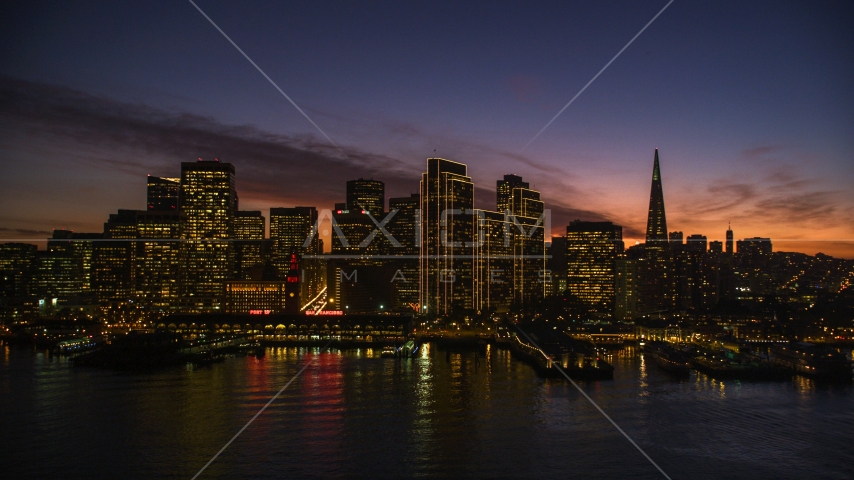 Ferry Building and the skyline of Downtown San Francisco, California, twilight Aerial Stock Photo DCSF10_062.0000187 | Axiom Images