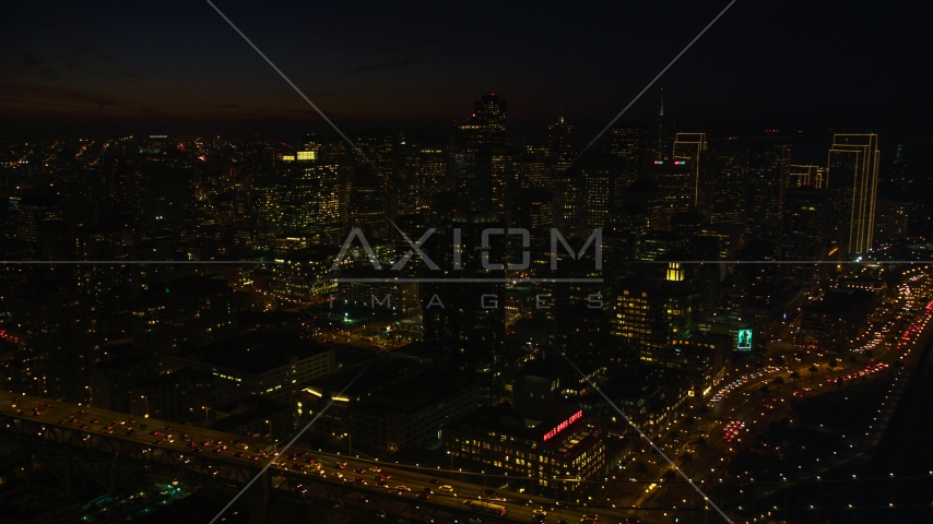 Downtown San Francisco skyscrapers seen from the Bay Bridge, California, night Aerial Stock Photo DCSF10_081.0000155 | Axiom Images