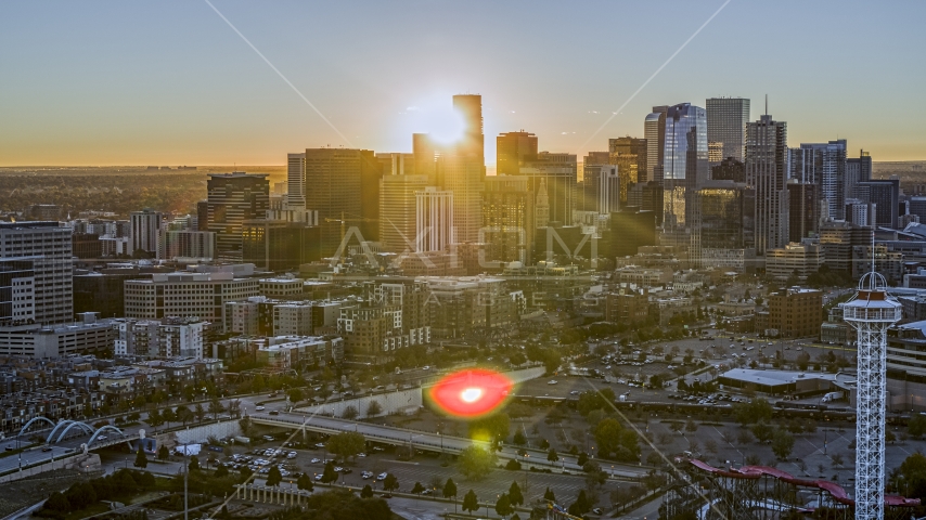 Sunrise behind the city's skyline in Downtown Denver, Colorado Aerial Stock Photo DXP001_000093 | Axiom Images