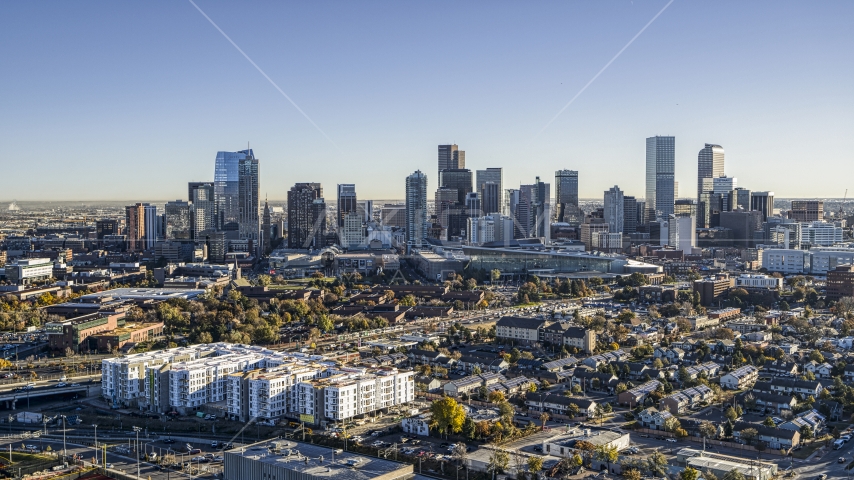 Wide view of towering skyscrapers of city skyline, Downtown Denver, Colorado Aerial Stock Photo DXP001_000123 | Axiom Images