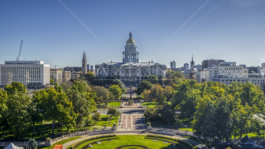 The Colorado State Capitol building seen while over Civic Center Park in Downtown Denver, Colorado Aerial Stock Photo DXP001_000143 | Axiom Images