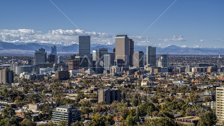 View across the city at the skyline of Downtown Denver, Colorado Aerial Stock Photo DXP001_000158 | Axiom Images