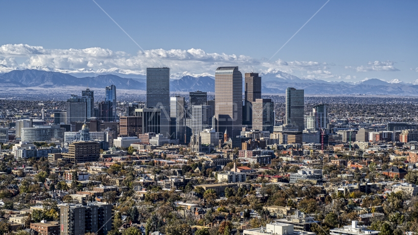 View across the city at the skyline's tall skyscrapers, Downtown Denver, Colorado Aerial Stock Photo DXP001_000159 | Axiom Images
