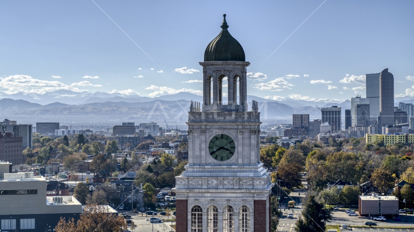 A tall clock tower, part of downtown skyline in background, Denver, Colorado Aerial Stock Photo DXP001_000162 | Axiom Images