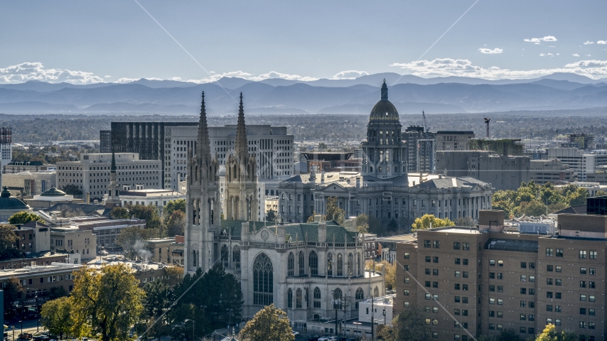 The Colorado State Capitol behind a cathedral, Downtown Denver, Colorado Aerial Stock Photo DXP001_000164 | Axiom Images