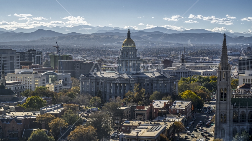 The Colorado State Capitol building with mountains in the background, Downtown Denver, Colorado Aerial Stock Photo DXP001_000165 | Axiom Images