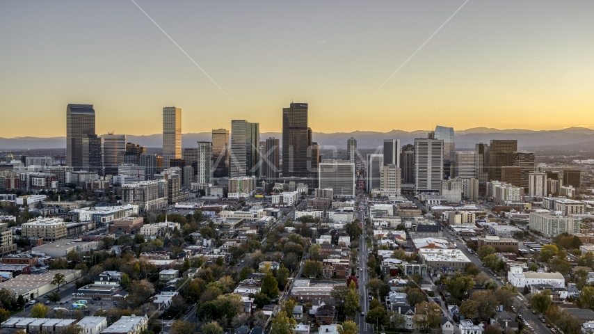 Wide view of the city's skyline at sunset, Downtown Denver, Colorado Aerial Stock Photo DXP001_000182 | Axiom Images