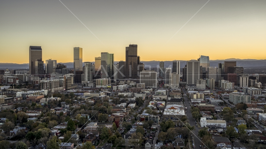 Wide view of the city's downtown skyline at sunset, Downtown Denver, Colorado Aerial Stock Photo DXP001_000183 | Axiom Images